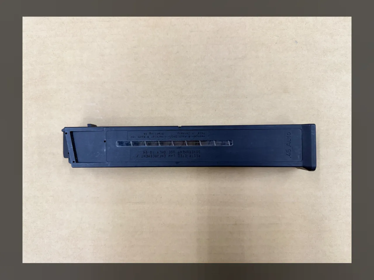 HK UMP Magazine - .45 ACP - 25 Round (Marked RESTRICTED LAW ENFORCEMENT / GOVERNMENT USE ONLY 10-94), photo 1 of 6
